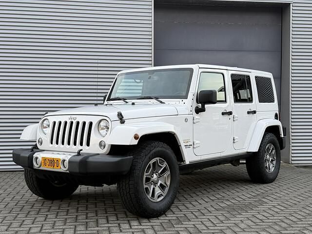 Wit Occasion 2014 Jeep Wrangler Unlimited Sahara SUV | € 36.999 (Eerlijke prijs) - Afbeelding 1/4