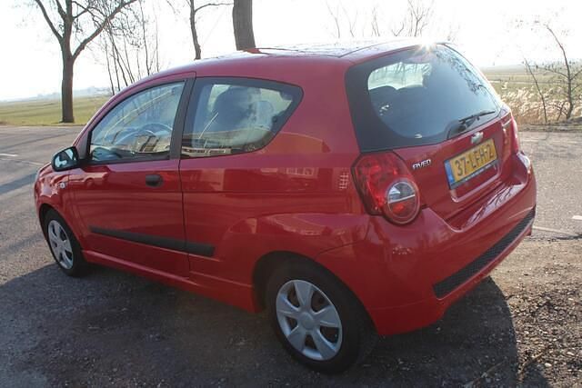 Occasion Chevrolet Aveo 84 PK (61 kW) 2010 Rood (metallic) Hatchback