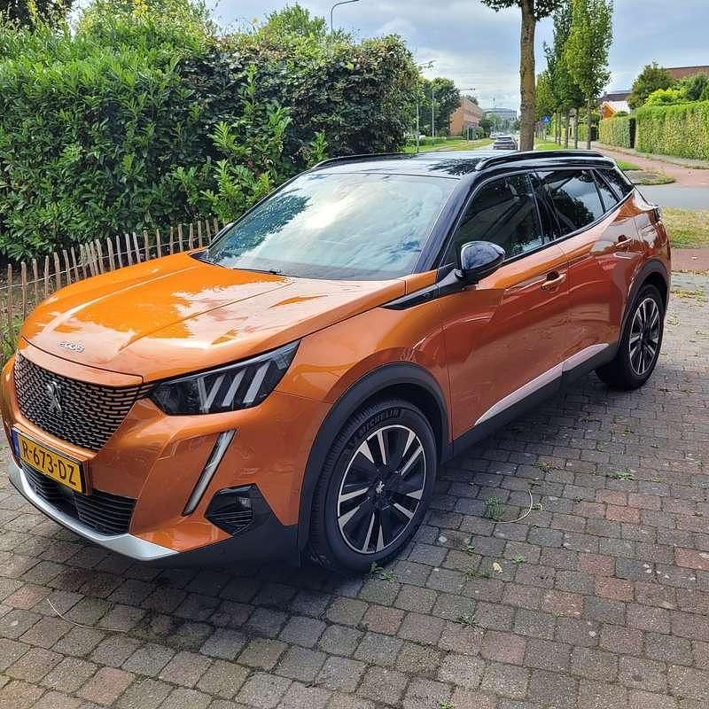 Oranje Gebruikt 2021 Peugeot e-2008 GT SUV | € 15.000 (Super prijs) - Afbeelding 1/4