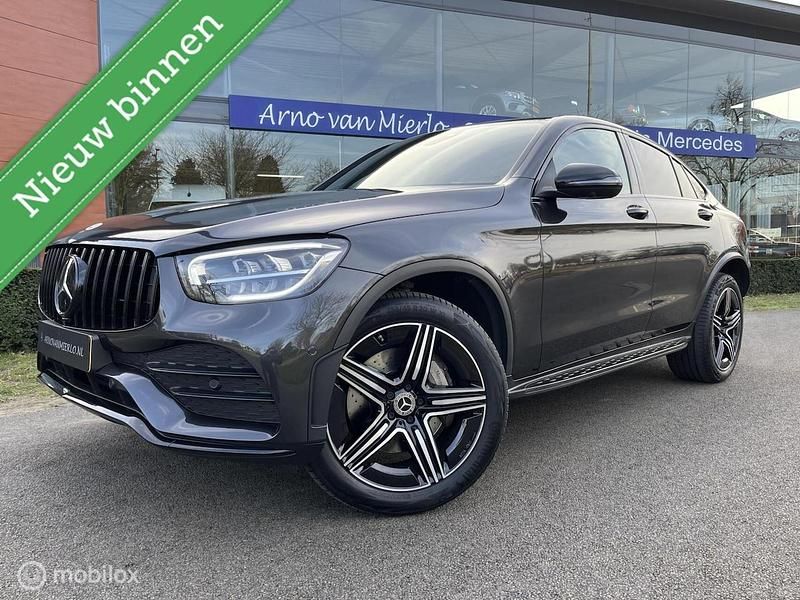 Grijs (metallic) Occasion 2023 Mercedes GLC300 AMG line Coupé | € 53.750 (Super prijs) - Afbeelding 1/4