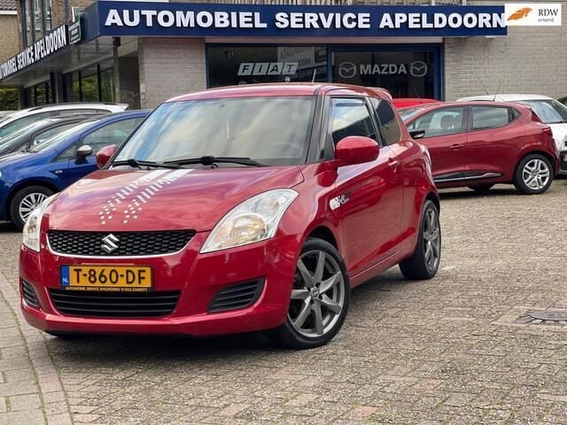 Rood Gebruikt 2014 Suzuki Swift Club Hatchback | € 6.950 (Eerlijke prijs) - Afbeelding 1/4