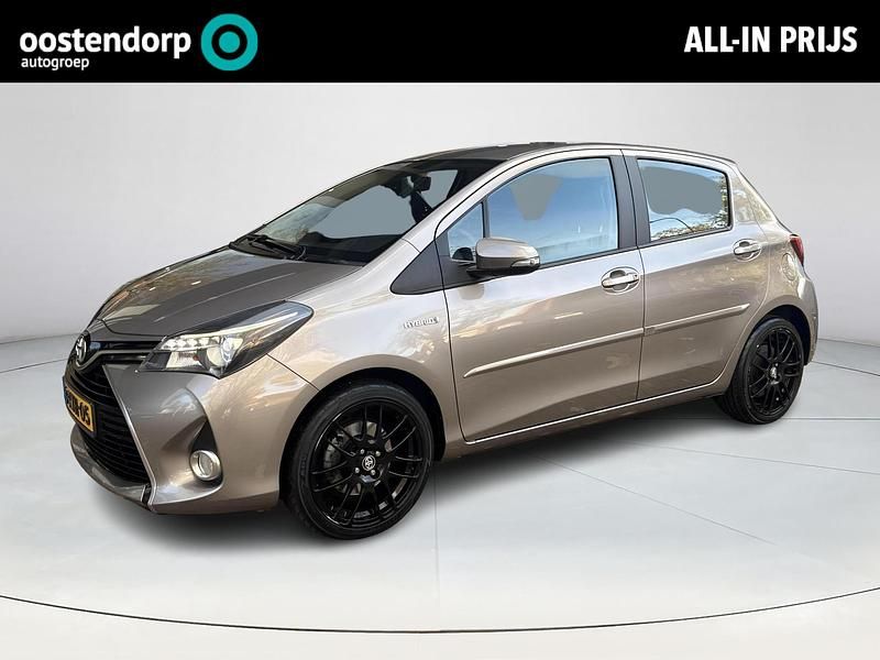 Bruin Gebruikt 2014 Toyota Yaris Hybrid Hatchback | € 12.949 (Duur) - Afbeelding 1/4