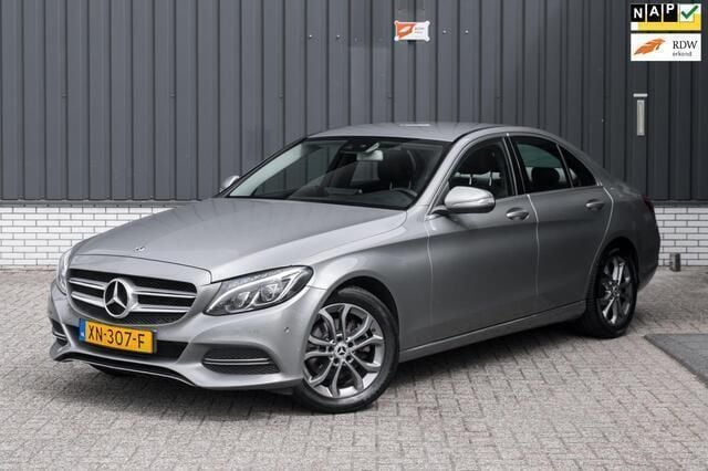 Grijs Gebruikt 2014 Mercedes C200 Prestige Sedan | € 15.950 (Goede deal) - Afbeelding 1/4
