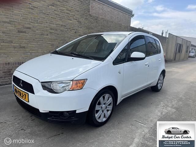 Wit Gebruikt 2012 Mitsubishi Colt Edition Hatchback | € 2.999 (Eerlijke prijs) - Afbeelding 1/4