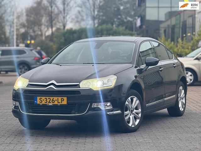 Grijs (metallic) Gebruikt 2012 Citroën C5 Exclusive Sedan | € 6.499 (Iets duurder) - Afbeelding 1/4