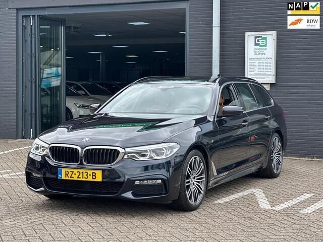 Zwart Gebruikt 2018 BMW 520 Executive Stationwagen | € 27.995 (Eerlijke prijs) - Afbeelding 1/4