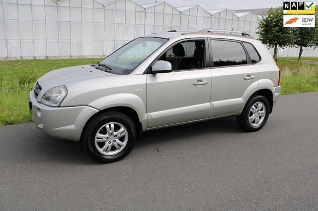 Grijs, metallic lak Gebruikt 2009 Hyundai Tucson Style SUV | € 6.950 (Duur) - Afbeelding 1/4