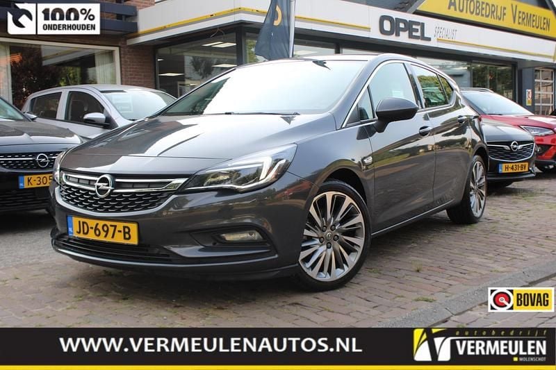Grijs Gebruikt 2016 Opel Astra Innovation Hatchback | € 12.950 (Goede deal) - Afbeelding 1/4