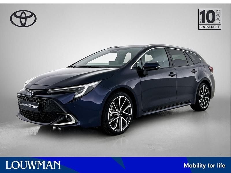 Blauw Gebruikt 2024 Toyota Corolla Hybrid Business Edition Stationwagen | € 32.950 (Eerlijke prijs) - Afbeelding 1/3