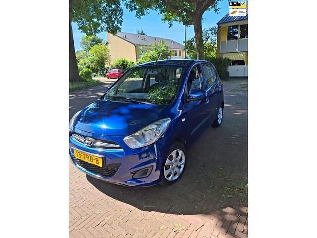 Blauw, metallic lak Gebruikt 2012 Hyundai i10 Hatchback | € 6.999 (Iets duurder) - Afbeelding 1/4