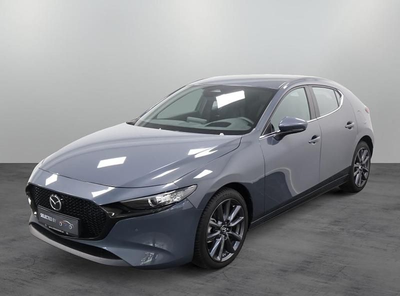 Grijs Gebruikt 2024 Mazda 3 Exclusive-Line Hatchback | € 32.295 (Eerlijke prijs) - Afbeelding 1/4