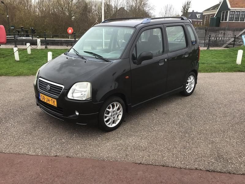 Zwart Occasion 2002 Suzuki Wagon R+ Stationwagen | € 1.250 (Eerlijke prijs) - Afbeelding 1/4
