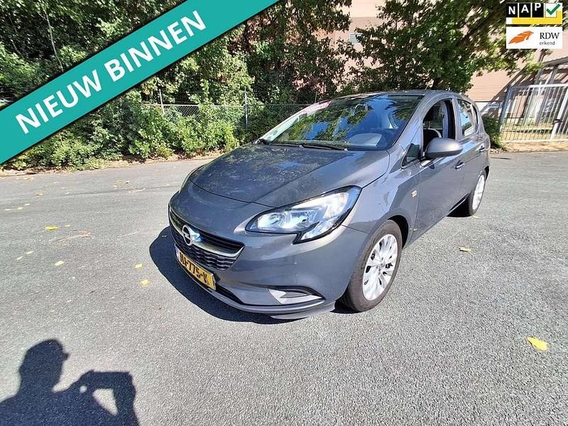 Grijs, metallic lak Gebruikt 2015 Opel Corsa Business Hatchback | € 5.199 (Eerlijke prijs) - Afbeelding 1/4