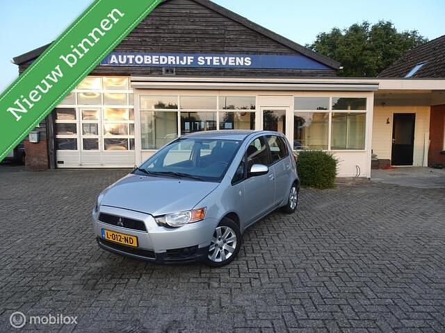 Grijs (metallic) Occasion 2011 Mitsubishi Colt Edition Hatchback | € 4.495 (Goede deal) - Afbeelding 1/4