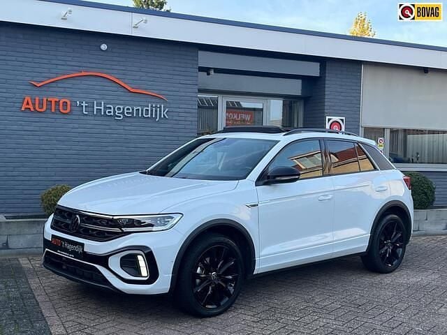 Wit (metallic) Gebruikt 2024 VW T-Roc R-line SUV | € 34.950 (Eerlijke prijs) - Afbeelding 1/4
