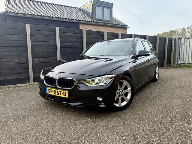 Zwart Gebruikt 2012 BMW 320 Executive Stationwagen | € 9.999 (Super prijs) - Afbeelding 1/4