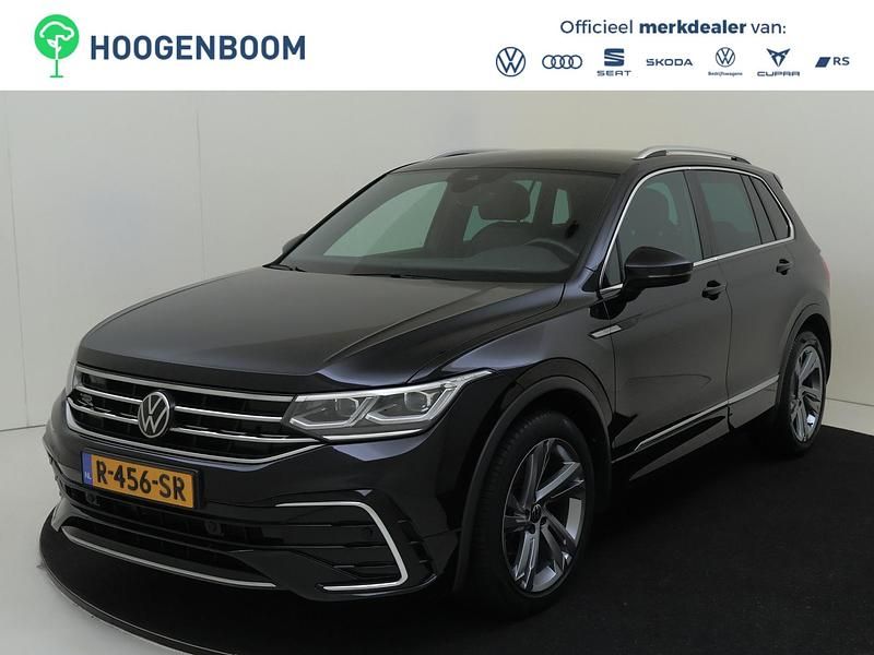 Zwart Gebruikt 2022 VW Tiguan Business+ SUV | € 36.750 (Goede deal) - Afbeelding 1/4