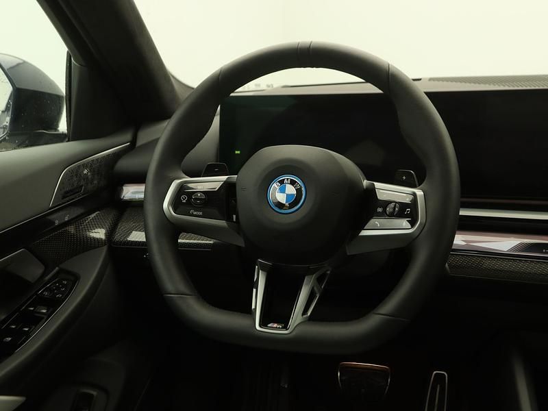 Occasion BMW 550e M Sport 489 PK (359 kW) 2024 Blauw Stationwagen