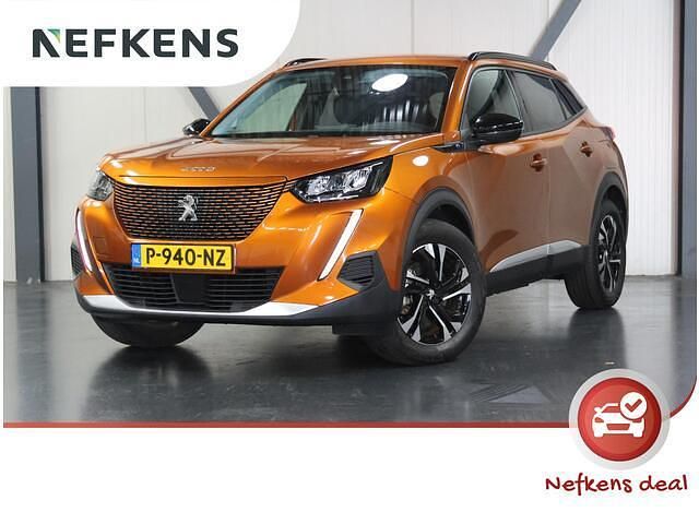 Oranje Gebruikt 2022 Peugeot e-2008 Allure SUV | € 19.295 (Eerlijke prijs) - Afbeelding 1/2