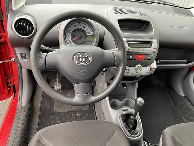 Occasion Toyota Aygo 68 PK (50 kW) 2009 Rood Hatchback