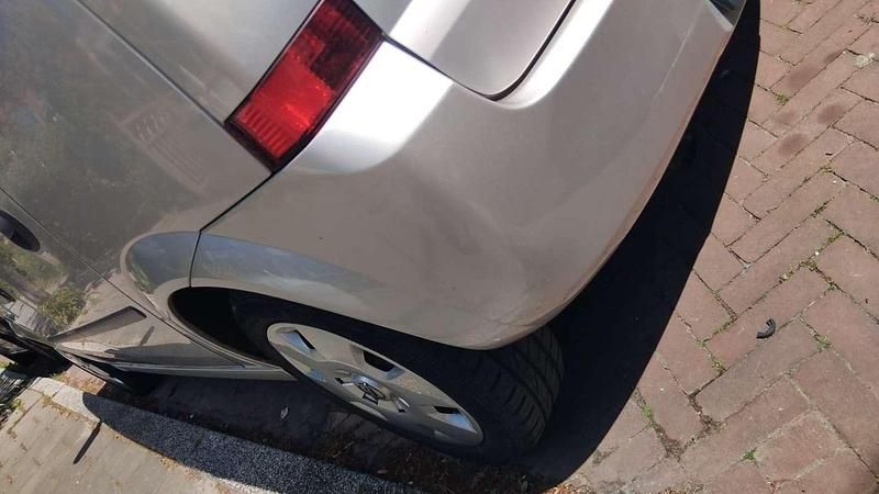 Grijs Gebruikt 2004 Opel Meriva Cosmo MPV | € 1.700 (Iets duurder) - Afbeelding 1/4