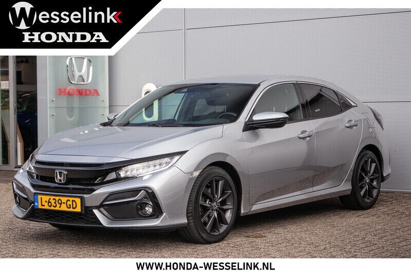 Grijs Gebruikt 2021 Honda Civic Elegance Hatchback | € 18.950 (Eerlijke prijs) - Afbeelding 1/4