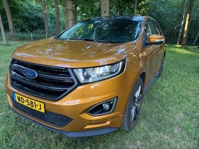 Oranje, metallic lak Gebruikt 2017 Ford Edge Sport SUV | € 20.950 - Afbeelding 1/4