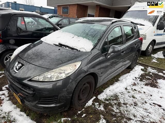 Grijs Occasion 2010 Peugeot 207 Stationwagen | € 600 (Goede deal) - Afbeelding 1/4