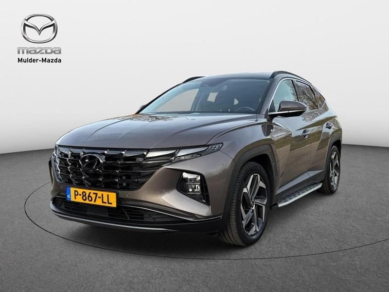 Bruin Gebruikt 2022 Hyundai Tucson Premium SUV | € 28.975 (Eerlijke prijs) - Afbeelding 1/4