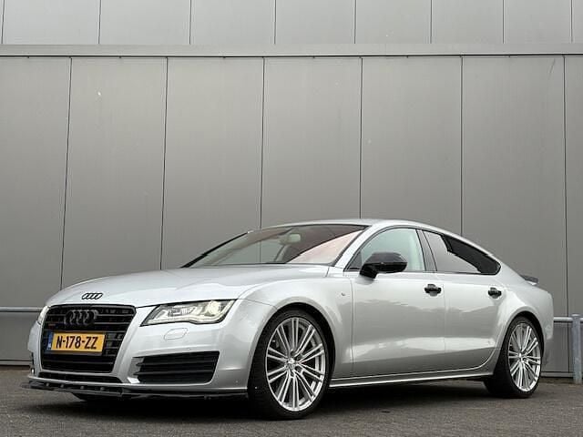 Grijs Gebruikt 2012 Audi A7 S-Line Hatchback | € 12.750 (Goede deal) - Afbeelding 1/4