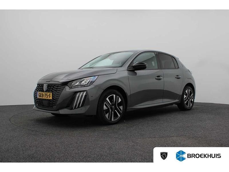 Grijs, metallic lak Gebruikt 2024 Peugeot e-208 Allure Hatchback | € 24.900 (Duur) - Afbeelding 1/4