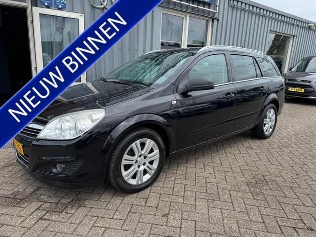Zwart, metallic lak Gebruikt 2009 Opel Astra Cosmo Stationwagen | € 2.499 (Goede deal) - Afbeelding 1/4
