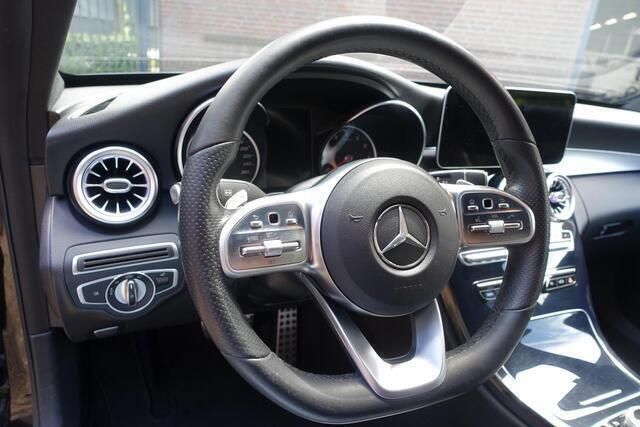 Occasion Mercedes C180 AMG Line Premium Plus 157 PK (115 kW) 2019 Zwart, metallic lak Sedan