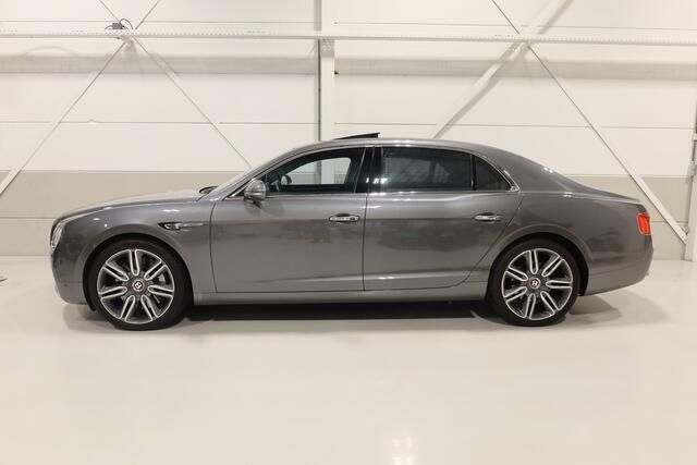 Occasion Bentley Flying Spur Mulliner 509 PK (374 kW) 2015 Grijs, metallic lak Sedan