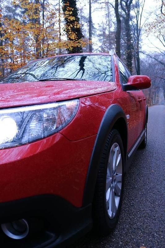 Occasion Saab 9-3X Aero 240 PK (176 kW) 2011 Rood Stationwagen