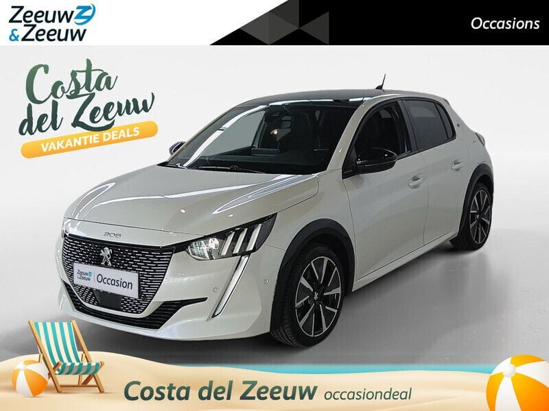 Blanc nacré (licht wit) Gebruikt 2022 Peugeot e-208 GT Hatchback | € 17.495 (Eerlijke prijs) - Afbeelding 1/4