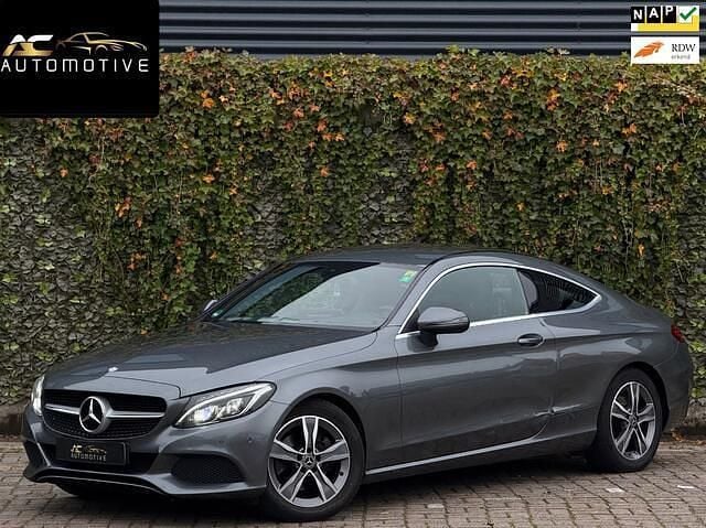 Grijs Gebruikt 2016 Mercedes C220 Coupé | € 11.950 (Eerlijke prijs) - Afbeelding 1/4