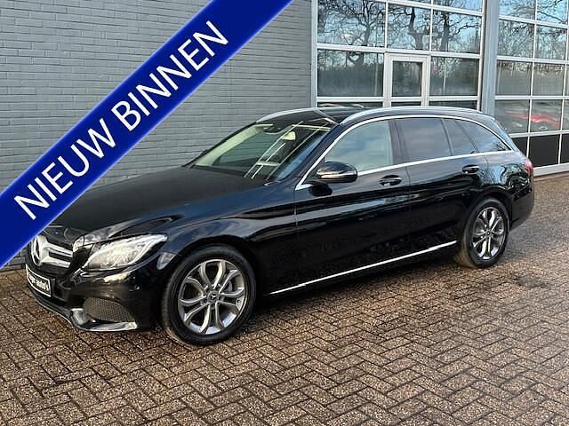 Zwart (metallic) Occasion 2018 Mercedes C180 Business Stationwagen | € 19.950 (Goede deal) - Afbeelding 1/4