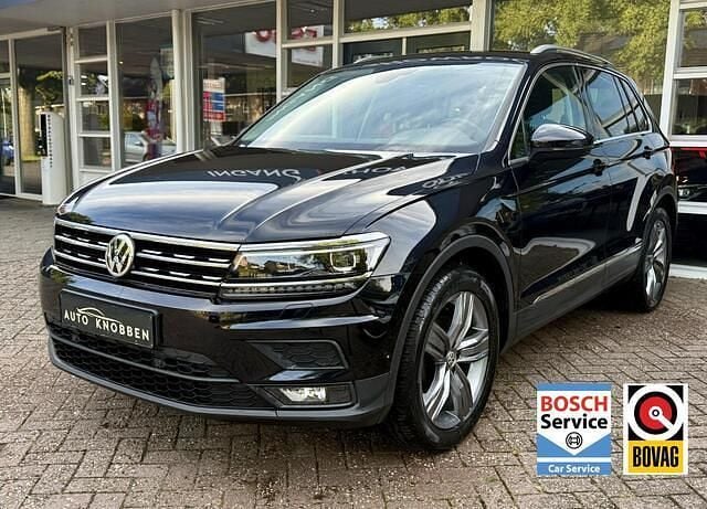 Zwart Gebruikt 2018 VW Tiguan Highline SUV | € 18.900 (Goede deal) - Afbeelding 1/4