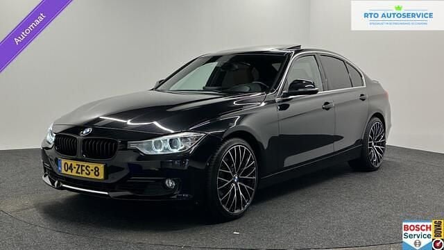 Zwart Occasion 2012 BMW 335 Comfort Edition Sedan | € 16.500 (Goede deal) - Afbeelding 1/4