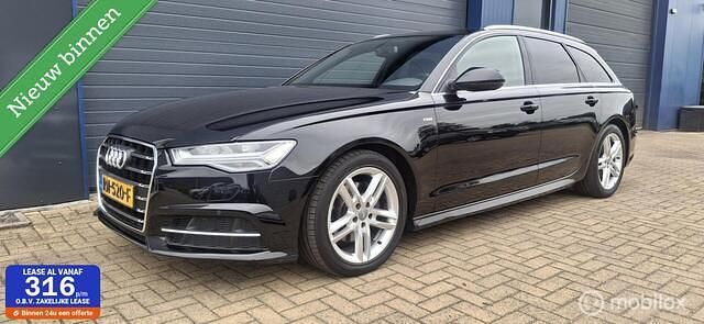 Zwart Gebruikt 2018 Audi A6 Stationwagen | € 18.999 (Goede deal) - Afbeelding 1/4