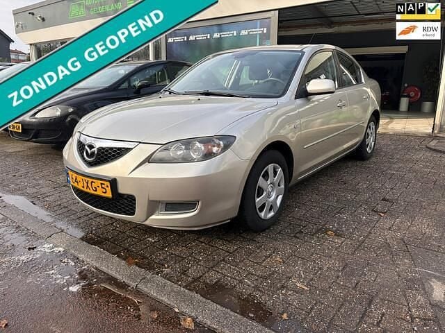 Grijs (metallic) Occasion 2009 Mazda 3 Touring Sedan | € 6.450 (Eerlijke prijs) - Afbeelding 1/4