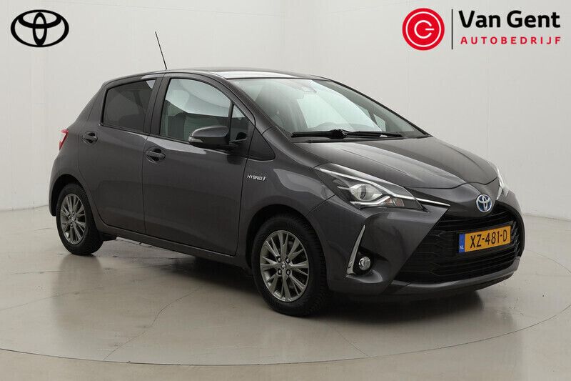 Grijs Gebruikt 2019 Toyota Yaris Hybrid Hatchback | € 16.499 (Goede deal) - Afbeelding 1/4