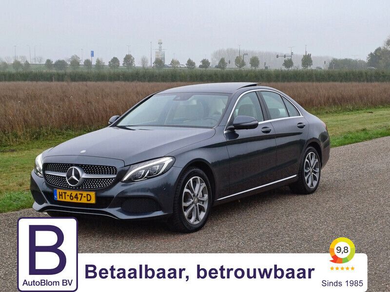 Grijs Gebruikt 2015 Mercedes C350e Exclusive Sedan | € 21.950 (Eerlijke prijs) - Afbeelding 1/4
