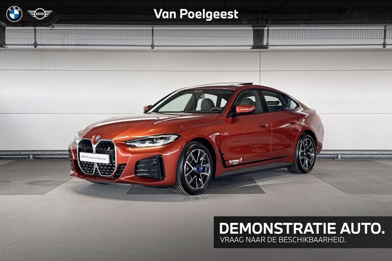 Oranje Gebruikt 2024 BMW i4 Executive Sedan | € 79.057 - Afbeelding 1/4