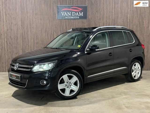 Zwart, metallic lak Gebruikt 2012 VW Tiguan Sport SUV | € 13.900 (Goede deal) - Afbeelding 1/4