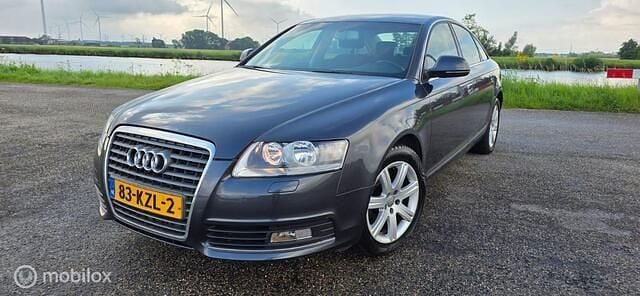 Grijs Gebruikt 2010 Audi A6 Business Sedan | € 4.950 (Eerlijke prijs) - Afbeelding 1/4