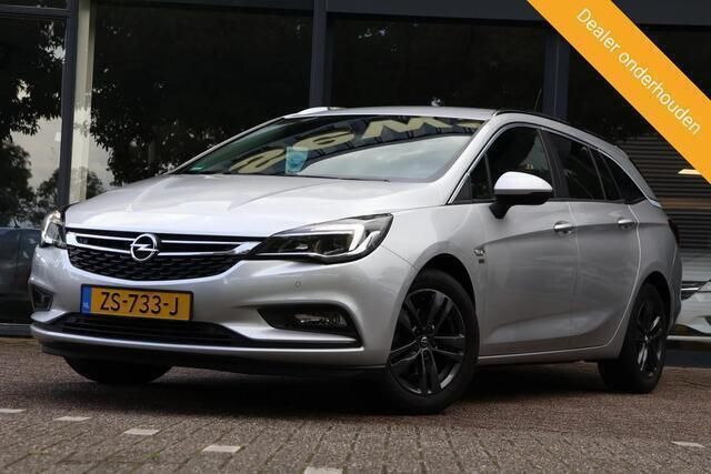 Grijs Gebruikt 2019 Opel Astra Edition Stationwagen | € 8.495 (Goede deal) - Afbeelding 1/4