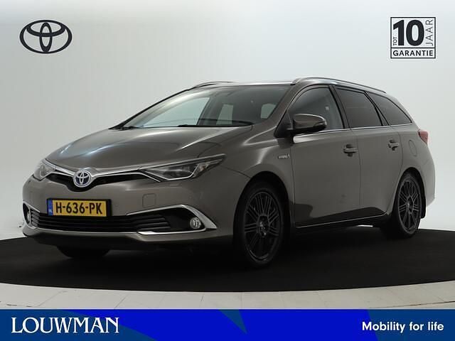 Bruin, metallic lak Gebruikt 2016 Toyota Auris Touring Sports Executive Stationwagen | € 15.945 (Eerlijke prijs) - Afbeelding 1/4