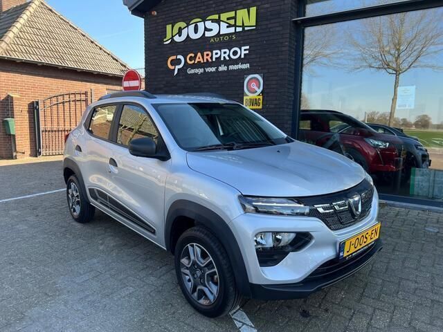 Grijs, metallic lak Gebruikt 2021 Dacia Spring Comfort Plus Hatchback | € 10.450 (Eerlijke prijs) - Afbeelding 1/4